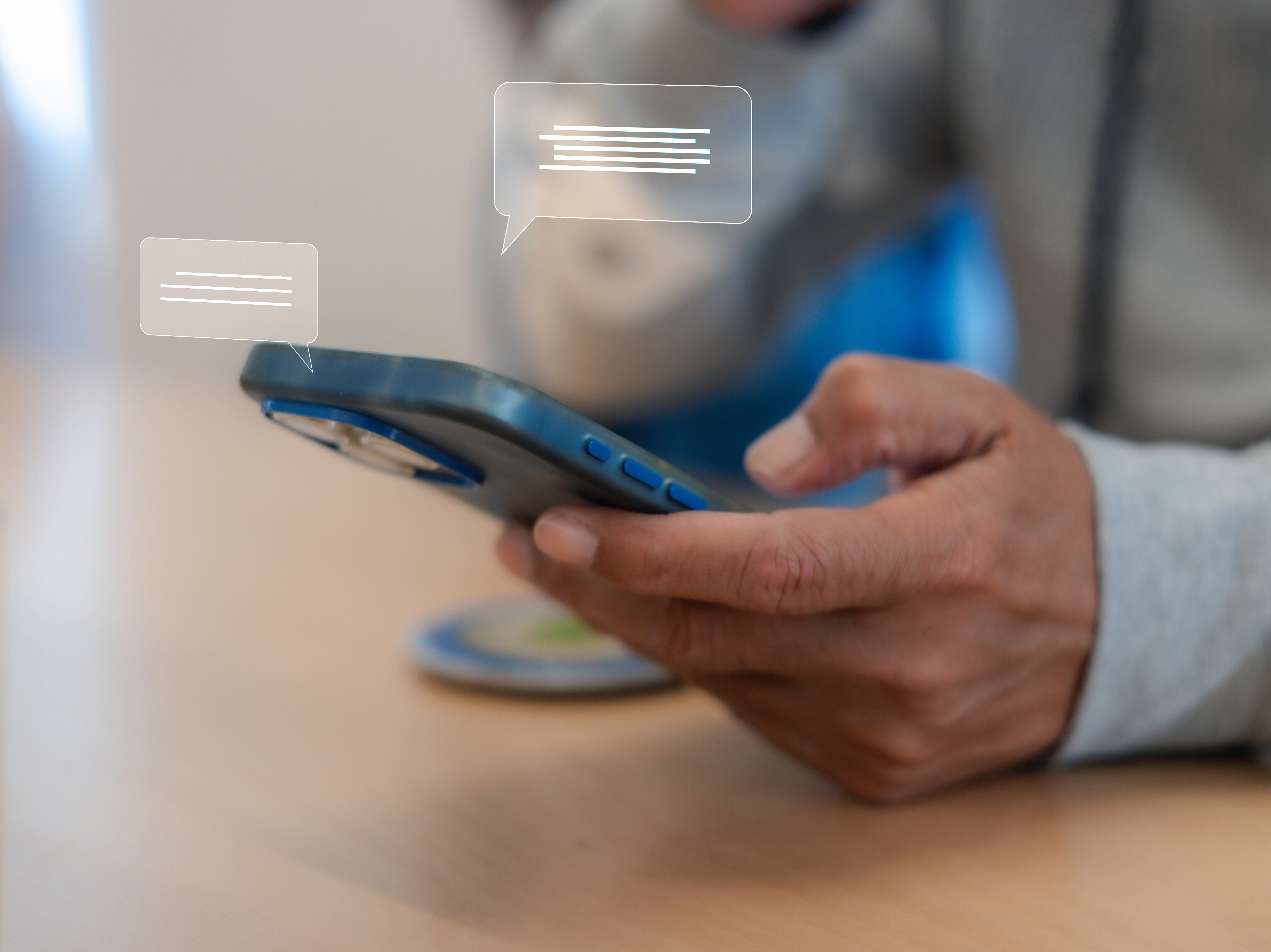 Close up man using smart phone, Social media marketing concept. hand using smartphone typing, chatting conversation in chat box icons pop up