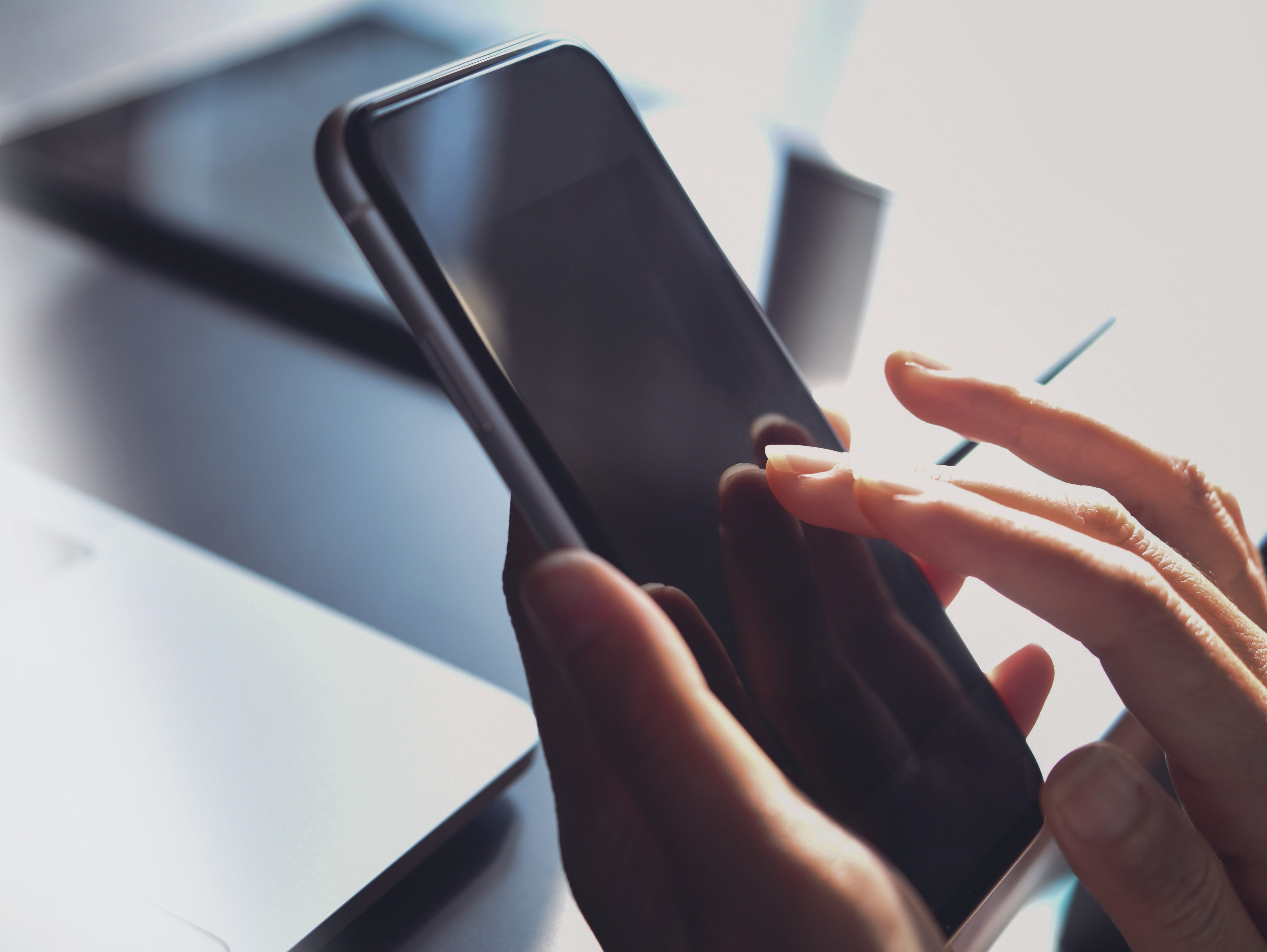 Close-up, business woman using smartphone, touching on screen, s